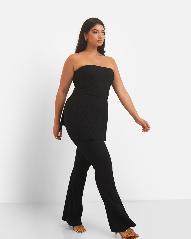 Front of a model wearing a size 5X Mika Textured Bell Bottom Pants - Black in Black by Rebdolls. | dia_product_style_image_id:325388